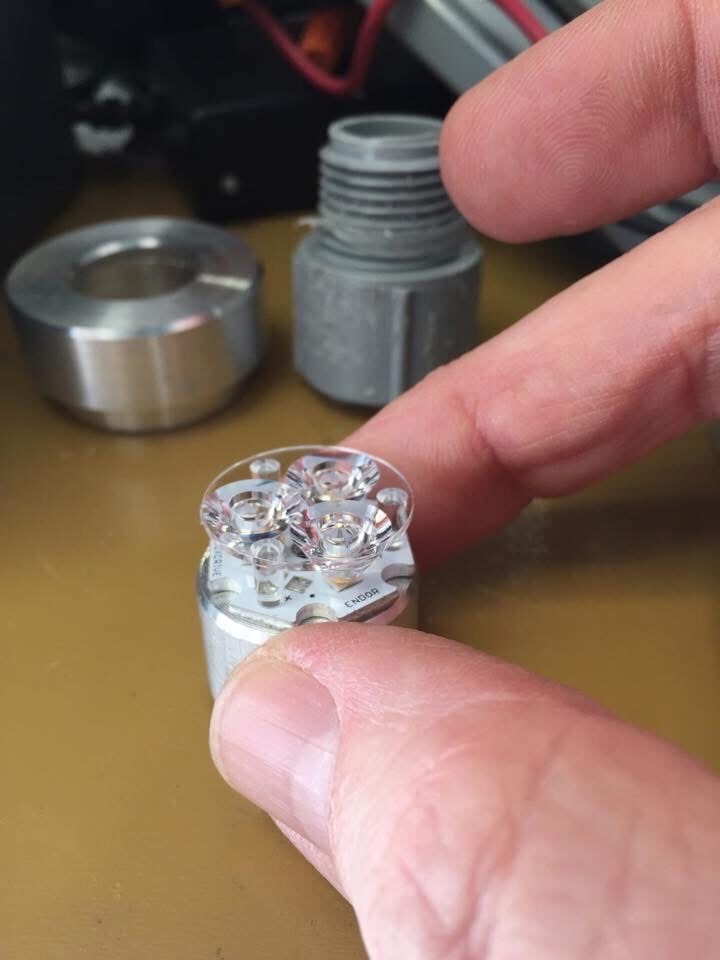LED heat sink and lens optics
