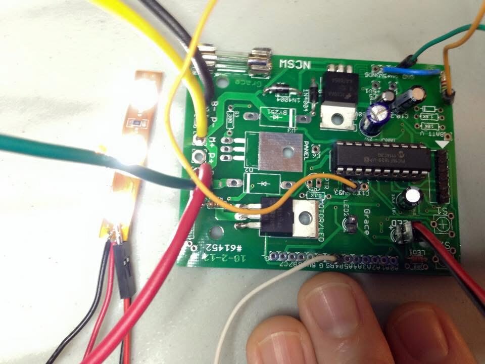 Solar controller board mounted in an enclosure