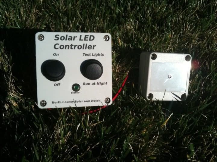 Solar LED controller with light-sensitive plug-in
