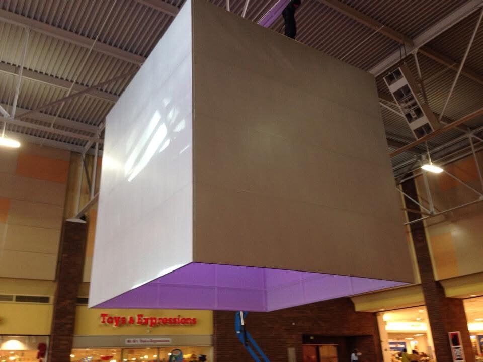 The Bloc cube glowing purple